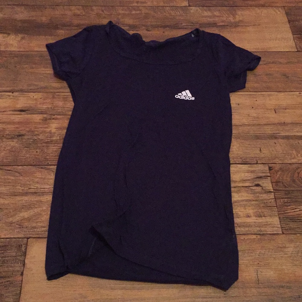 This is a dark blue Adidas shirt for women